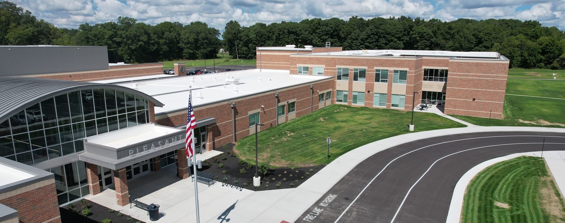 front of building, academic wing in background